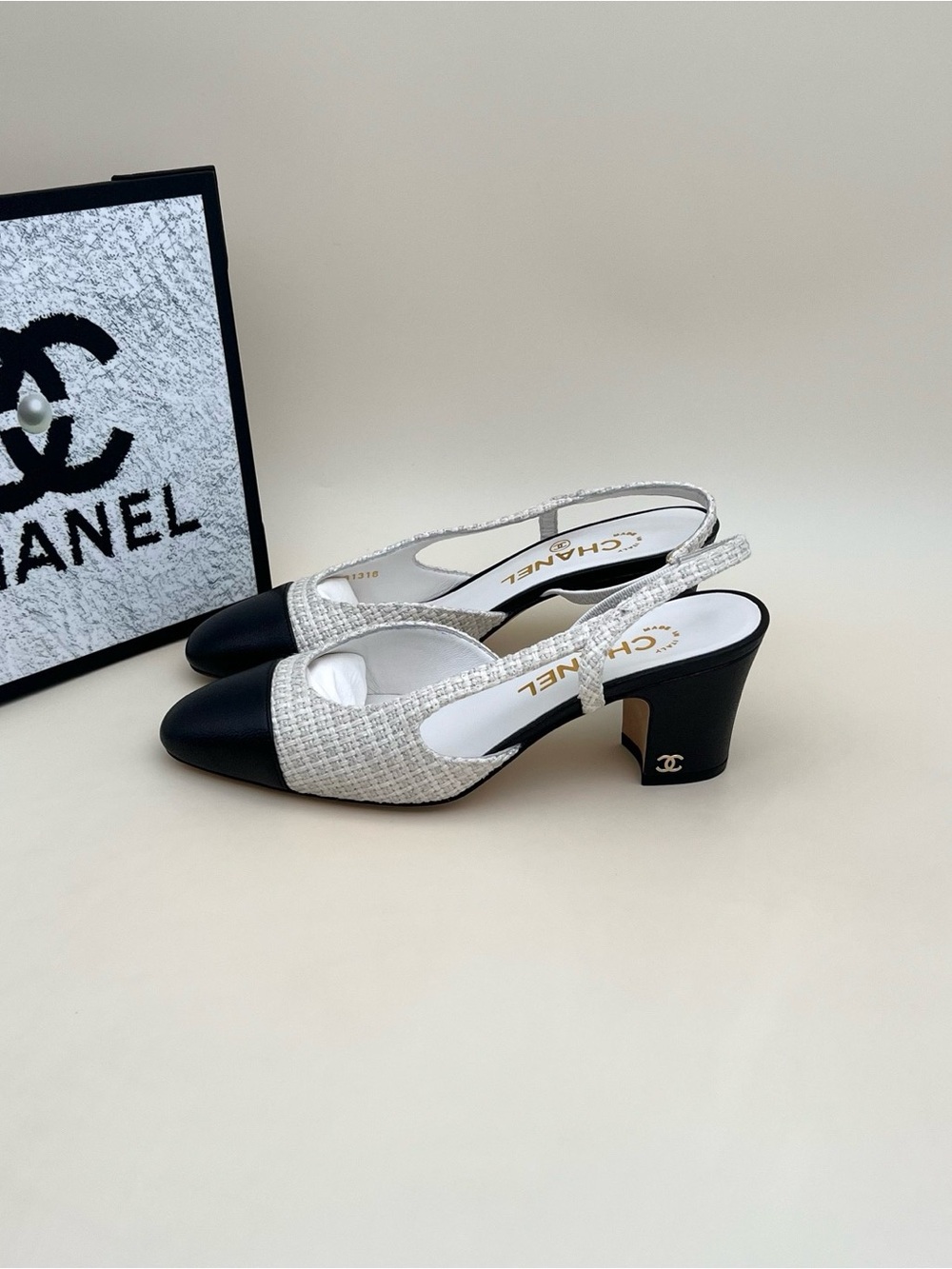 CHANEL Two-Tone Tweed Slingback Heels in Black and White